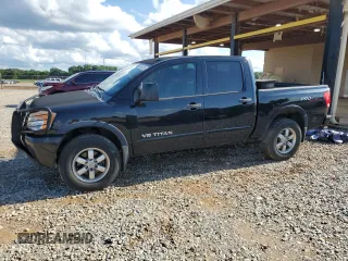 2012 Nissan Titan SV with VIN 1N6BA0EC6CN312465, listed as a Copart auction lot 58722815 with 186,207 mi miles and Salvage title. Bid and sale history available at DreamBid. Image 1.