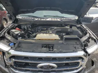 2021 Ford F-150 XL with VIN 1FTEW1EP0MFB98114, listed as a Copart auction lot 55892705 with 47,619 mi miles and Salvage title. Bid and sale history available at DreamBid. Image 11.