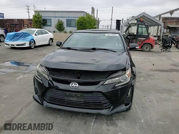 2015 Scion tC z VIN JTKJF5C75F3093123, wystawiony jako Copart lot #58414325 z przebiegiem 107 051 mil mil oraz Szkoda całkowita • Salvage title. Historia ofert i sprzedaży dostępna na DreamBid. Obrazek 13.