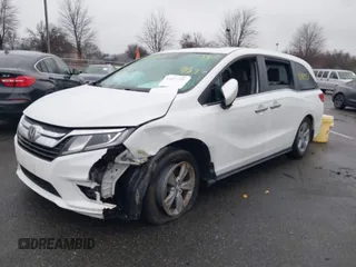 2020 Honda Odyssey EX-L with VIN 5FNRL6H78LB031411, listed as a IAAI auction lot 41027726 with 55,586 mi miles. Bid and sale history available at carsss.com. Image 2.