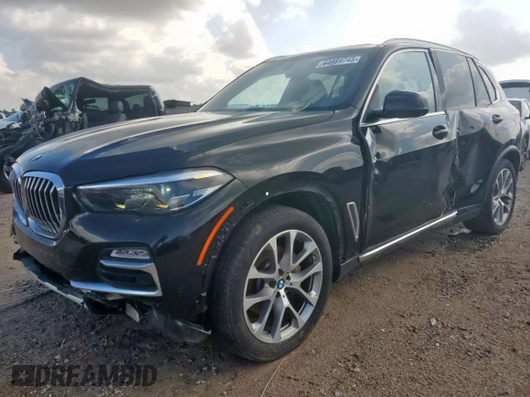2019 BMW X5 xDrive40i with VIN 5UXCR6C54KLL35873, listed as a Copart auction lot 64989745 with 129,538 mi miles and Salvage title. Bid and sale history available at DreamBid. Image 1.