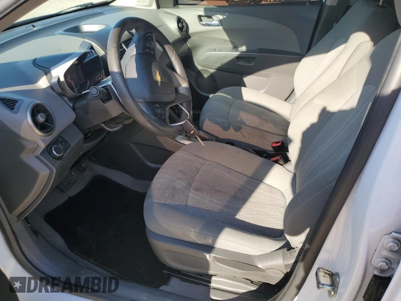2016 Chevrolet Sonic LT with VIN 1G1JC6SH7G4168926, listed as a Copart auction lot 52443675 with 54,553 mi miles and Salvage Title. Bid and sale history available at carsss.com. Image 7.