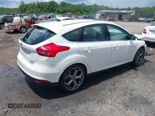 2016 Ford Focus Titanium with VIN 1FADP3N21GL309340, listed as a IAAI auction lot 42518653 with 101,555 mi miles and . Bid and sale history available at DreamBid. Image 4.