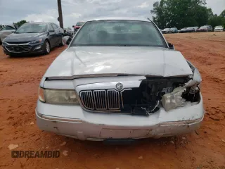 1999 Mercury Grand Marquis LS z VIN 2MEFM75W3XX617388, wystawiony jako Copart lot #58811195 z przebiegiem 162 600 mil mil oraz Szkoda całkowita • Salvage title. Historia ofert i sprzedaży dostępna na DreamBid. Obrazek 5.