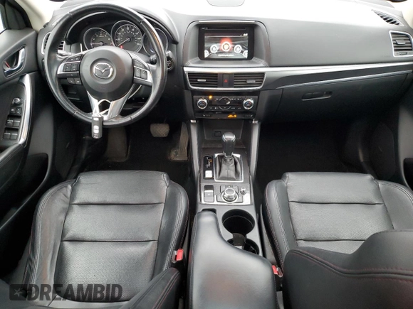 2016 Mazda CX-5 Grand Touring with VIN JM3KE4DY7G0761594, listed as a Copart auction lot 51514595 with 58,250 mi miles and Salvage Title. Bid and sale history available at DreamBid. Image 8.