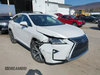 2016 Lexus RX 450h with VIN 2T2BGMCAXGC004844, listed as a IAAI auction lot 41791066 with 100,604 mi miles and . Bid and sale history available at DreamBid. Image 6.
