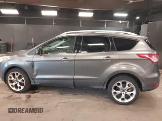 2014 Ford Escape Titanium with VIN 1FMCU9JX0EUE45254, listed as a IAAI auction lot 42038700 with 60,103 mi miles. Bid and sale history available at carsss.com. Image 14.