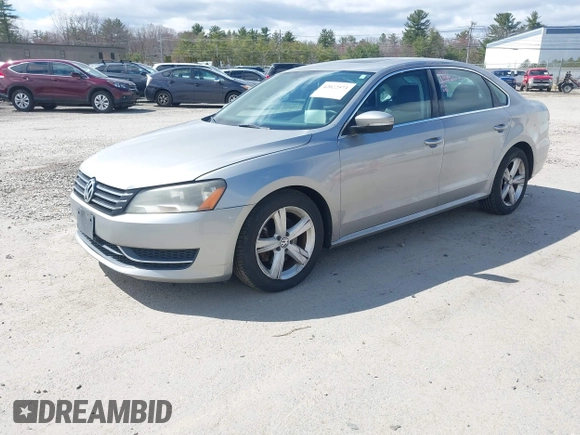 2013 Volkswagen Passat SE w/Sunroof & Nav with VIN 1VWBP7A37DC125598, listed as a IAAI auction lot 42022573 with 149,812 mi miles. Bid and sale history available at carsss.com. Image 2.
