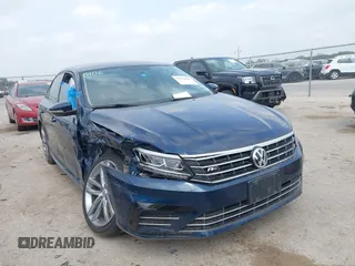 2018 Volkswagen Passat S z VIN 1VWAA7A35JC040106, wystawiony jako IAAI lot #41921626 z przebiegiem 60 785 mil mil oraz . Historia ofert i sprzedaży dostępna na DreamBid. Obrazek 1.
