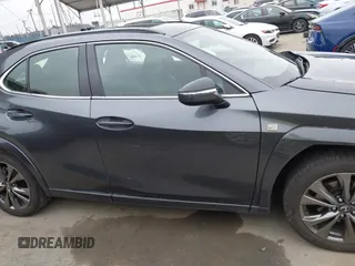 2023 Lexus UX 250h F Sport z VIN JTHB6JBH9P2132431, wystawiony jako IAAI lot #42137625 z przebiegiem 15 923 mil mil oraz . Historia ofert i sprzedaży dostępna na DreamBid. Obrazek 13.