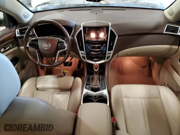 2015 Cadillac SRX Luxury Collection z VIN 3GYFNEE33FS641781, wystawiony jako Copart lot #50765905 z przebiegiem Nie podano mil oraz Szkody całkowita. Historia ofert i sprzedaży dostępna na DreamBid. Obrazek 8.