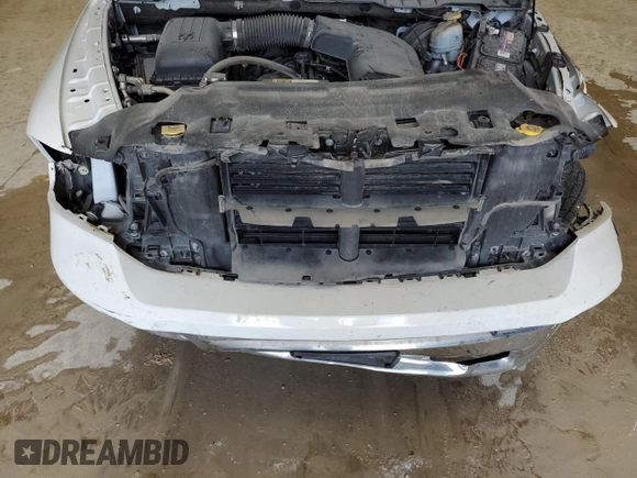 2022 Ram 1500 Tradesman with VIN 3C6RR6KG6NG210865, listed as a Copart auction lot 84045534 with 58,805 mi miles and Salvage title. Bid and sale history available at DreamBid. Image 11.