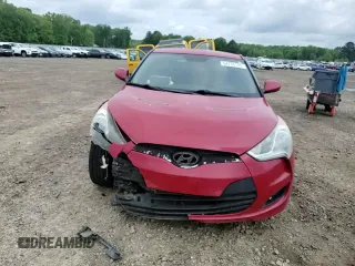 2013 Hyundai Veloster w/Black Int z VIN KMHTC6AD5DU173242, wystawiony jako Copart lot #54733125 z przebiegiem 157 766 mil mil oraz Czysty tytuł • Clean title. Historia ofert i sprzedaży dostępna na DreamBid. Obrazek 13.