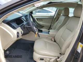 2015 Ford Taurus SEL with VIN 1FAHP2E89FG193926, listed as a Copart auction lot 61036375 with 23,963 mi miles and Salvage title. Bid and sale history available at DreamBid. Image 7.