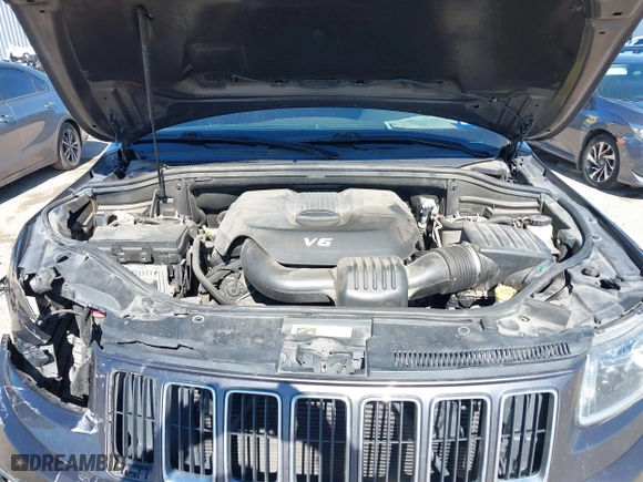 2014 Jeep Grand Cherokee Laredo with VIN 1C4RJEAG4EC317072, listed as a IAAI auction lot 41476862 with 127,742 mi miles. Bid and sale history available at carsss.com. Image 10.