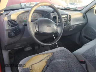 2000 Ford F-150 XL z VIN 1FTPF17L6YNA37670, wystawiony jako Copart lot #83479314 z przebiegiem 205 364 mil mil oraz Szkoda całkowita • Salvage title. Historia ofert i sprzedaży dostępna na DreamBid. Obrazek 8.