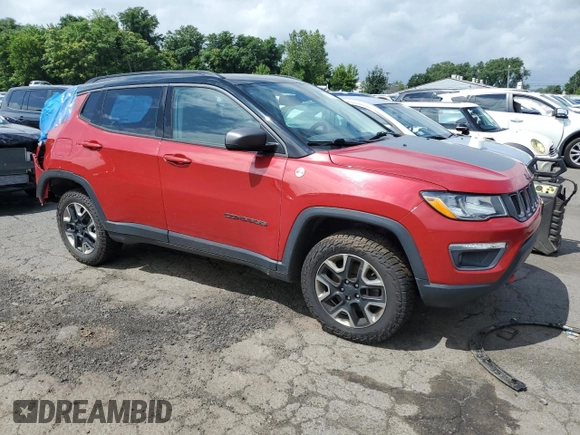 2017 Jeep Compass Trailhawk with VIN 3C4NJDDB7HT657463, listed as a Copart auction lot 60650765 with 100,979 mi miles and Salvage title. Bid and sale history available at DreamBid. Image 4.