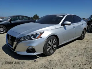 2019 Nissan Altima SL with VIN 1N4BL4EV4KC181168, listed as a Copart auction lot 60063285 with 119,329 mi miles and Salvage title. Bid and sale history available at DreamBid. Image 1.