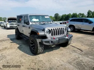 2018 Jeep Wrangler Unlimited Rubicon with VIN 1C4HJXFG8JW205965, listed as a Copart auction lot 60817014 with 26,321 mi miles and Salvage Title. Bid and sale history available at carsss.com. Image 11.