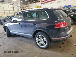 2015 Volkswagen Touareg Sport with VIN WVGEF9BP3FD003121, listed as a Copart auction lot 50572505 with 87,082 mi miles and Salvage title. Bid and sale history available at DreamBid. Image 2.
