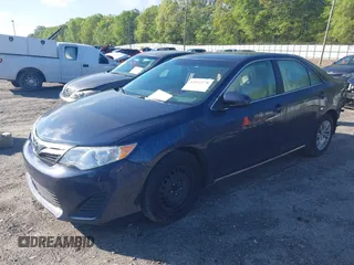2014 Toyota Camry L with VIN 4T1BF1FK3EU820882, listed as a IAAI auction lot 42012278 with 174,000 mi miles and . Bid and sale history available at DreamBid. Image 2.