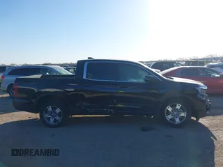 2025 Honda Ridgeline RTL z VIN 5FPYK3F57SB001319, wystawiony jako IAAI lot #41765594 z przebiegiem 1 358 mil mil oraz . Historia ofert i sprzedaży dostępna na DreamBid. Obrazek 12.