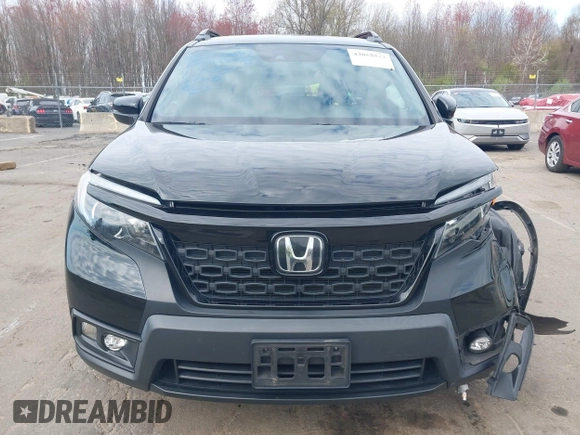 2019 Honda Passport EX-L with VIN 5FNYF8H5XKB024116, listed as a IAAI auction lot 42055543 with 68,641 mi miles and . Bid and sale history available at DreamBid. Image 12.