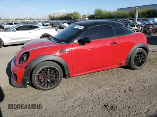 2015 MINI Coupe S z VIN WMWSX3C59FT409468, wystawiony jako Copart lot #71401384 z przebiegiem Nie podano mil oraz Szkody całkowita. Historia ofert i sprzedaży dostępna na DreamBid. Obrazek 1.