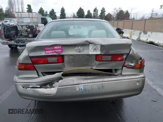 1998 Toyota Camry LE z VIN JT2BG22K7W0225872, wystawiony jako IAAI lot #41252434 z przebiegiem 160 763 mil mil oraz . Historia ofert i sprzedaży dostępna na DreamBid. Obrazek 16.