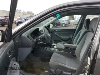 2004 Honda Civic LX with VIN 2HGES16504H621170, listed as a Copart auction lot 52159735 with 147,849 mi miles and Salvage Title. Bid and sale history available at carsss.com. Image 7.