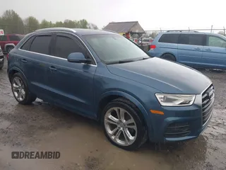 2016 Audi Q3 Premium Plus z VIN WA1EFCFSXGR015667, wystawiony jako IAAI lot #42201938 z przebiegiem 133 359 mil mil oraz . Historia ofert i sprzedaży dostępna na DreamBid. Obrazek 1.