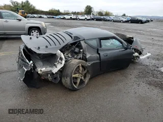 2021 Lotus Evora GT z VIN SCCLMDDN5MHA10403, wystawiony jako Copart lot #52484955 z przebiegiem Nie podano mil oraz Szkody całkowita. Historia ofert i sprzedaży dostępna na DreamBid. Obrazek 3.