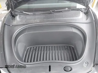 2024 Tesla Model 3 z VIN 5YJ3E1EA3RF737102, wystawiony jako IAAI lot #41562661 z przebiegiem 9 638 mil mil oraz . Historia ofert i sprzedaży dostępna na DreamBid. Obrazek 10.