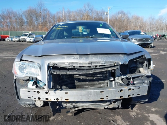 2014 Chrysler 300 C with VIN 2C3CCAKG2EH273274, listed as a IAAI auction lot 41638665 with 164,888 mi miles and . Bid and sale history available at carsss.com. Image 6.