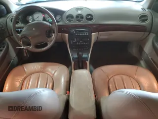 2001 Chrysler LHS z VIN 2C3HC56G61H659519, wystawiony jako Copart lot #48898595 z przebiegiem 124 966 mil mil oraz Szkody całkowita. Historia ofert i sprzedaży dostępna na DreamBid. Obrazek 8.