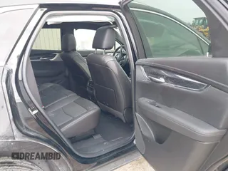 2021 Cadillac XT5 AWD Premium Luxury with VIN 1GYKNDRS7MZ168493, listed as a IAAI auction lot 41395162 with 33,064 mi miles. Bid and sale history available at carsss.com. Image 8.