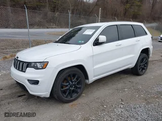 2018 Jeep Grand Cherokee Laredo E with VIN 1C4RJFAG6JC152867, listed as a IAAI auction lot 41486884 with 67,115 mi miles. Bid and sale history available at carsss.com. Image 20.