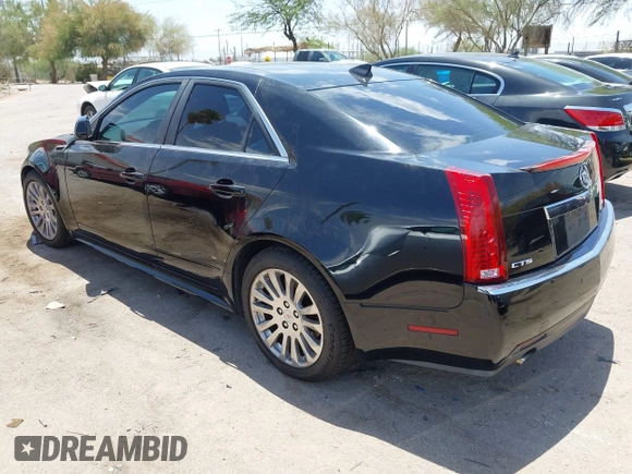 2012 Cadillac CTS Premium with VIN 1G6DP5E35C0129064, listed as a IAAI auction lot 42666308 with 151,694 mi miles and . Bid and sale history available at DreamBid. Image 3.