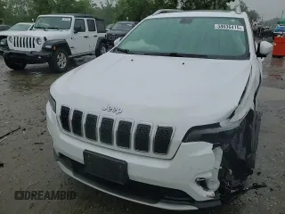 2019 Jeep Cherokee Limited z VIN 1C4PJMDXXKD409564, wystawiony jako Copart lot #60893225 z przebiegiem 128 674 mil mil oraz Szkoda całkowita • Salvage title. Historia ofert i sprzedaży dostępna na DreamBid. Obrazek 14.