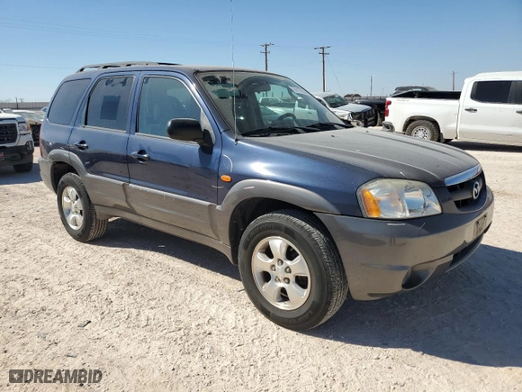 2003 Mazda Tribute LX with VIN 4F2YZ04123KM23151, listed as a Copart auction lot 74117164 with 112,790 mi miles and Salvage Title. Bid and sale history available at carsss.com. Image 4.