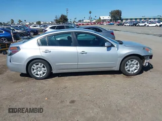 2009 Nissan Altima S with VIN 1N4AL21E39N477996, listed as a IAAI auction lot 41809042 with 147,644 mi miles and . Bid and sale history available at DreamBid. Image 14.