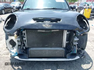 2015 MINI Hardtop 4 Door S z VIN WMWXU3C58F2B66601, wystawiony jako IAAI lot #42444404 z przebiegiem 76 174 mil mil oraz . Historia ofert i sprzedaży dostępna na DreamBid. Obrazek 6.