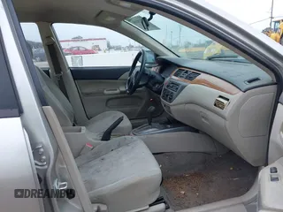 2006 Mitsubishi Lancer ES with VIN JA3AJ26E36U043781, listed as a IAAI auction lot 41778580 with 166,141 mi miles. Bid and sale history available at carsss.com. Image 5.