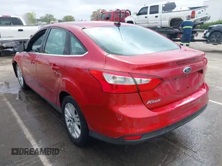 2012 Ford Focus SEL with VIN 1FAHP3H27CL338414, listed as a IAAI auction lot 41925915 with 128,123 mi miles. Bid and sale history available at carsss.com. Image 3.