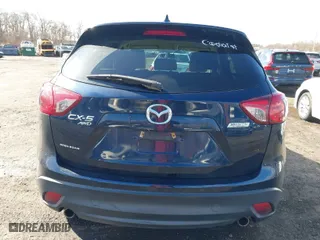 2016 Mazda CX-5 Touring with VIN JM3KE4CY6G0717393, listed as a IAAI auction lot 41596084 with 150,774 mi miles. Bid and sale history available at carsss.com. Image 16.