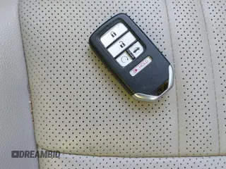 2020 Honda Accord Touring with VIN 1HGCV3F93LA001214, listed as a IAAI auction lot 41408864 with 130,545 mi miles and . Bid and sale history available at DreamBid. Image 11.