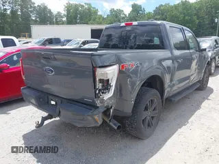 2021 Ford F-150 XL with VIN 1FTFW1E8XMFC04210, listed as a IAAI auction lot 42493373 with 99,181 mi miles and . Bid and sale history available at DreamBid. Image 4.