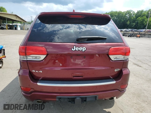 2017 Jeep Grand Cherokee Overland with VIN 1C4RJFCG5HC874130, listed as a Copart auction lot 65324695 with 101,588 mi miles and Salvage title. Bid and sale history available at DreamBid. Image 6.