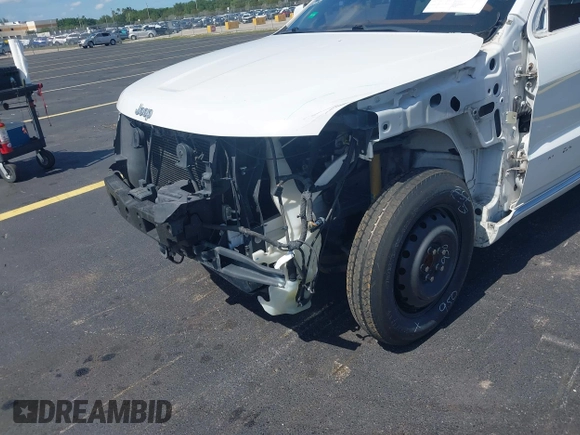 2015 Jeep Grand Cherokee Summit with VIN 1C4RJEJG5FC105038, listed as a IAAI auction lot 42555024 with 133,077 mi miles and . Bid and sale history available at DreamBid. Image 21.