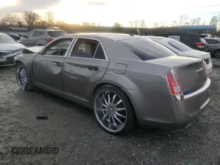 2014 Chrysler 300 with VIN 2C3CCAEG8EH156827, listed as a Copart auction lot 44994055 with 81,210 mi miles and Salvage Title. Bid and sale history available at carsss.com. Image 2.